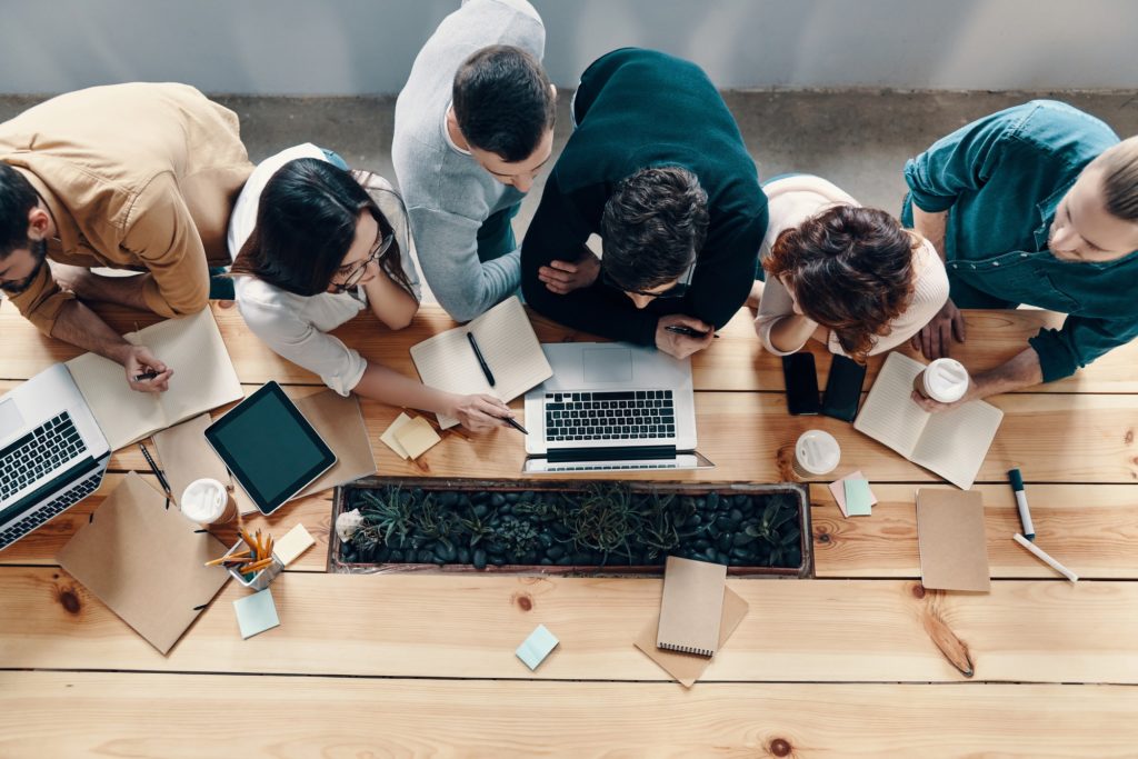 launch IT support team working at a desk